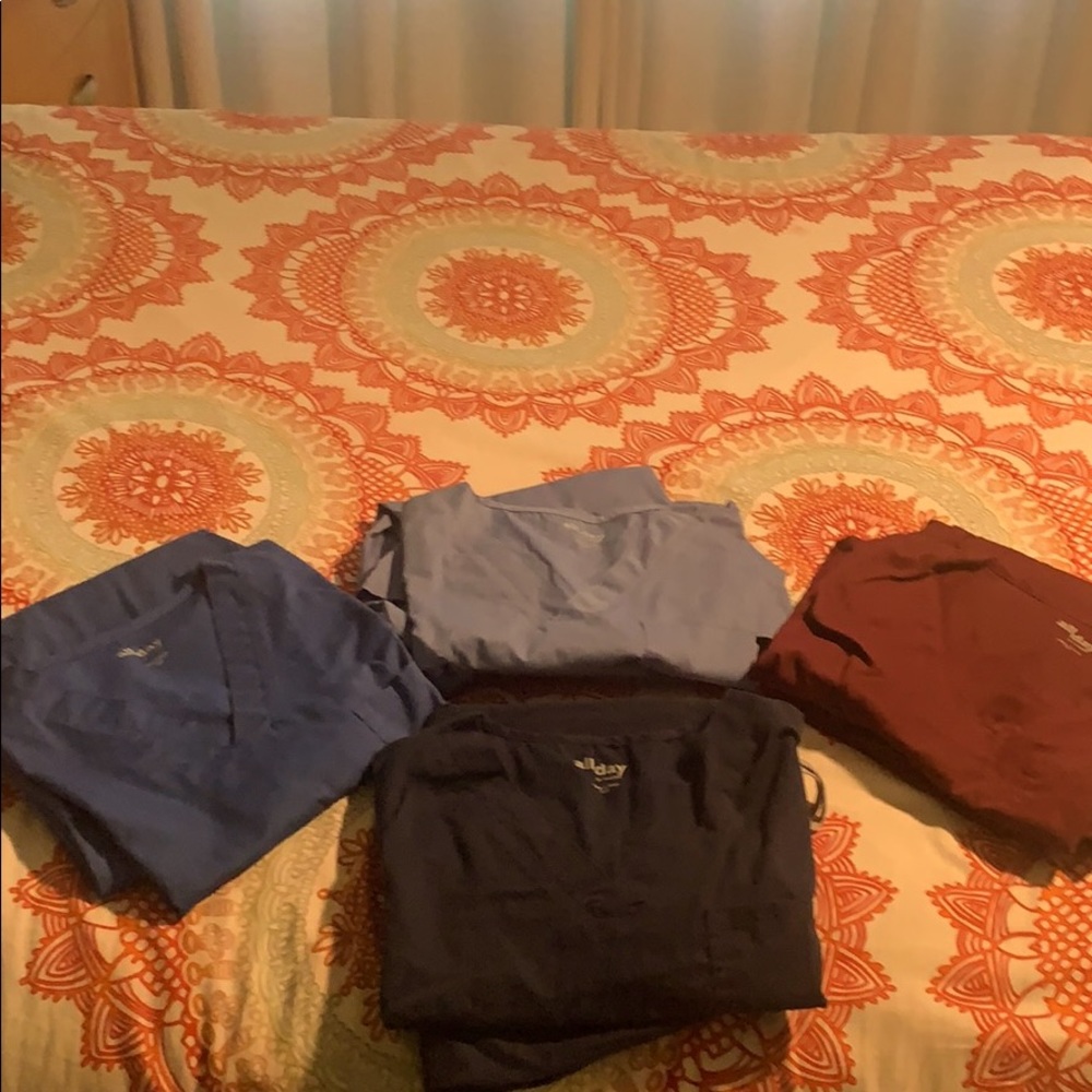 Lot of 4 pairs of scrubs.